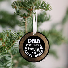 Load image into Gallery viewer, DNA Does Not Make a Family Love Does Christmas Ornament - Get 30% OFF + FREE Shipping When You Order 10 Or More.
